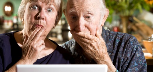 perplexed Senior Couple with a Laptop Computer